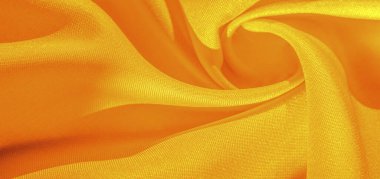 Limon sarısı ipek kumaş, pürüzsüz saten kumaş. Doku, arkaplan, desen