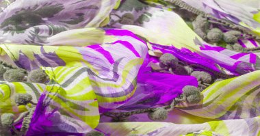 doku arkaplan deseni. Renkli dantelli ipek kumaş. Sarı mavi ve gri-mavi gözlükler. Dizaynınız, aksanınız, duvar kağıtlarınız, posterleriniz ve kartpostallarınız için mükemmel. Olasılıkların sonsuz.