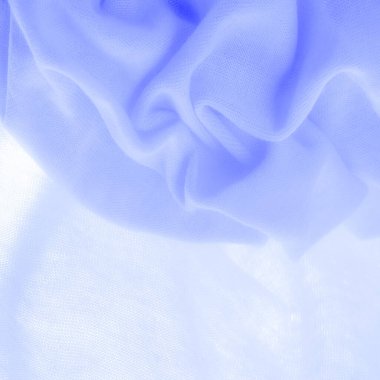 Mavi kumaş, lüks kumaşın soyut arkaplanı ya da dalgaların sıvı ipek dokusu ya da dalgalı kıvrımlar. arka plan ya da zarif duvar kağıdı tasarımı. Pamuk dokusu, doğal kumaş ve boya, parlak mavi renk.
