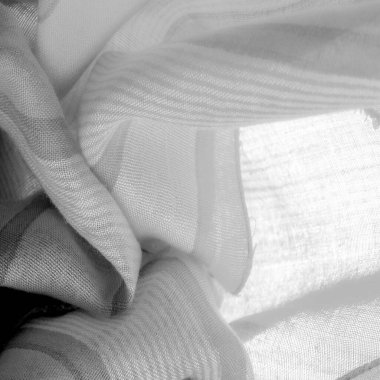 Doku. Geçmişi. Tek renkli gri ipek kumaş, bir fotoğraf ya da resim siyah beyaz ya da tek renk farklı tonlarda geliştirilmiş ya da uygulanmış..