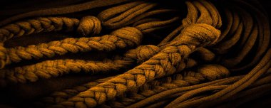 Doku, arka plan, desen. Sarı örgülü kumaş. Kabartmalı desenli örgü bir arka plan. Örgü ören örgüler..