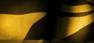 Doku. Şablon. Görüntü. Soyut sarı ipekten kumaşlar. İpek dokusu, soyutlama, tasarım ve duvar kağıdı için lüks saten.,