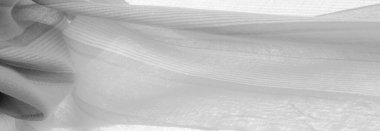 Doku. Geçmişi. Tek renkli gri ipek kumaş, bir fotoğraf ya da resim siyah beyaz ya da tek renk farklı tonlarda geliştirilmiş ya da uygulanmış..