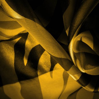 Doku. Desen. Desen. Soyut sarı ipekten kumaşlar. İpek dokusu, soyutlama için lüks saten, tasarım ve duvar kağıdı, yumuşak ve bulanık stil, pürüzsüz,