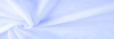 Mavi kumaş, lüks kumaşın soyut arkaplanı ya da dalgaların sıvı ipek dokusu ya da dalgalı kıvrımlar. arka plan ya da zarif duvar kağıdı tasarımı. Pamuk dokusu, doğal kumaş ve boya, parlak mavi renk.