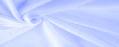 Mavi kumaş, lüks kumaşın soyut arkaplanı ya da dalgaların sıvı ipek dokusu ya da dalgalı kıvrımlar. arka plan ya da zarif duvar kağıdı tasarımı. Pamuk dokusu, doğal kumaş ve boya, parlak mavi renk.