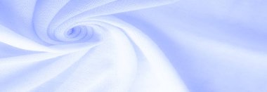 Mavi kumaş, lüks kumaşın soyut arkaplanı ya da dalgaların sıvı ipek dokusu ya da dalgalı kıvrımlar. arka plan ya da zarif duvar kağıdı tasarımı. Pamuk dokusu, doğal kumaş ve boya, parlak mavi renk.