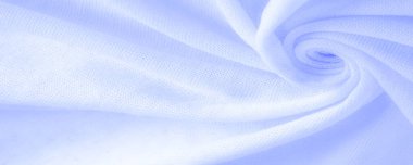 Mavi kumaş, lüks kumaşın soyut arkaplanı ya da dalgaların sıvı ipek dokusu ya da dalgalı kıvrımlar. arka plan ya da zarif duvar kağıdı tasarımı. Pamuk dokusu, doğal kumaş ve boya, parlak mavi renk.