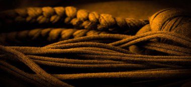 Doku, arka plan, desen. Sarı örgülü kumaş. Kabartmalı desenli örgü bir arka plan. Örgü ören örgüler..