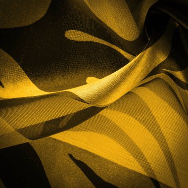 Doku. Desen. Desen. Soyut sarı ipekten kumaşlar. İpek dokusu, soyutlama için lüks saten, tasarım ve duvar kağıdı, yumuşak ve bulanık stil, pürüzsüz,