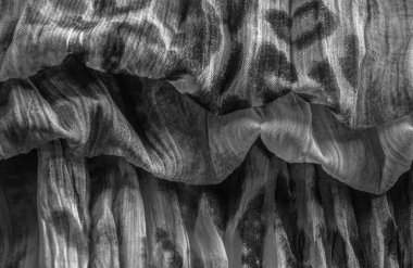 Panter desenli ince organzalı ipek kumaş, siyah ve beyaz. Buruşuk doku. Geçmişi. Şablon.