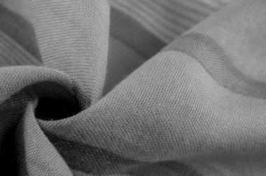 Doku. Geçmişi. Tek renkli gri ipek kumaş, bir fotoğraf ya da resim siyah beyaz ya da tek renk farklı tonlarda geliştirilmiş ya da uygulanmış..