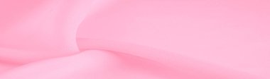 Doku. şablon. İpek kırmızı polyester. Pembe ipek kumaşın arka planı. Şeffaf arkaplan ve elbise dikmek için açık kumaştan yapılmış. Tekstil panoraması