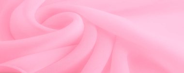 Doku. şablon. İpek kırmızı polyester. Pembe ipek kumaşın arka planı. Şeffaf arkaplan ve elbise dikmek için açık kumaştan yapılmış. Tekstil panoraması