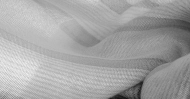 Doku. Geçmişi. Tek renkli gri ipek kumaş, bir fotoğraf ya da resim siyah beyaz ya da tek renk farklı tonlarda geliştirilmiş ya da uygulanmış..