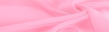 Doku. şablon. İpek kırmızı polyester. Pembe ipek kumaşın arka planı. Şeffaf arkaplan ve elbise dikmek için açık kumaştan yapılmış. Tekstil panoraması