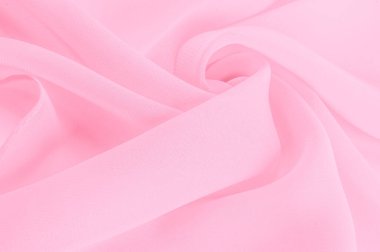 Doku. şablon. İpek kırmızı polyester. Pembe ipek kumaşın arka planı. Şeffaf arkaplan ve elbise dikmek için açık kumaştan yapılmış. Tekstil panoraması