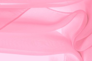 Doku. şablon. İpek kırmızı polyester. Pembe ipek kumaşın arka planı. Şeffaf arkaplan ve elbise dikmek için açık kumaştan yapılmış. Tekstil panoraması
