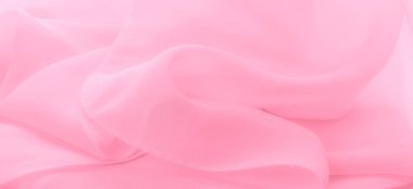 Doku. şablon. İpek kırmızı polyester. Pembe ipek kumaşın arka planı. Şeffaf arkaplan ve elbise dikmek için açık kumaştan yapılmış. Tekstil panoraması