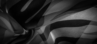 Doku. Geçmişi. Şablon. Soyut siyah ve beyaz renklerde ipek kumaş. Soyut suluboya, desenli dikey ipek kumaş, tuval, makro, yakın çekim.