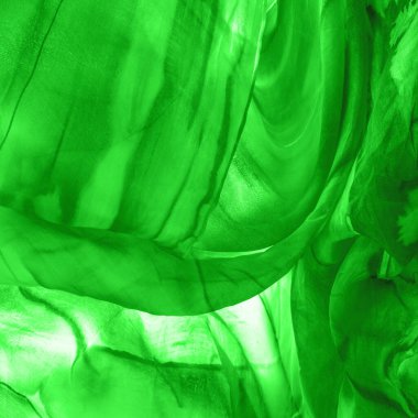 Yeşil arka planda gri lekeli yeşil kumaş. Soyut tasarımcı kumaş tasarımcısı. Tasarımın için güzel bir arka plan. Doku. Görüntü. çizim, kalıp, şekil