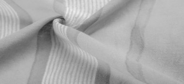 Doku. Geçmişi. Tek renkli gri ipek kumaş, bir fotoğraf ya da resim siyah beyaz ya da tek renk farklı tonlarda geliştirilmiş ya da uygulanmış..