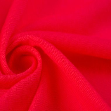 Kırmızı bez. Lüks kumaşın soyut arka planı ya da dalgaların sıvı ipek dokusu ya da dalgalı kıvrımlar. arka plan ya da zarif duvar kağıdı tasarımı. Pamuk dokusu, doğal kumaş ve boya, parlak kırmızı renk..