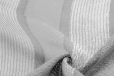 Doku. Geçmişi. Tek renkli gri ipek kumaş, bir fotoğraf ya da resim siyah beyaz ya da tek renk farklı tonlarda geliştirilmiş ya da uygulanmış..