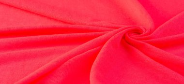 Kırmızı bez. Lüks kumaşın soyut arka planı ya da dalgaların sıvı ipek dokusu ya da dalgalı kıvrımlar. arka plan ya da zarif duvar kağıdı tasarımı. Pamuk dokusu, doğal kumaş ve boya, parlak kırmızı renk..