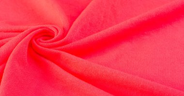 Kırmızı bez. Lüks kumaşın soyut arka planı ya da dalgaların sıvı ipek dokusu ya da dalgalı kıvrımlar. arka plan ya da zarif duvar kağıdı tasarımı. Pamuk dokusu, doğal kumaş ve boya, parlak kırmızı renk..