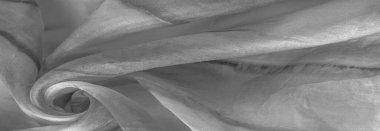 Beyaz arka planda gri benekli siyah beyaz kumaş. Soyut tasarımcı kumaş tasarımcısı. Tasarımın için güzel bir arka plan. Doku. Görüntü. çizim, kalıp, şekil