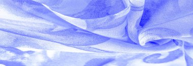 Doku, Desen. Soyut mavi desenli pürüzsüz mavi kumaş dokusu. Lüks soyut bir arka plan. Lüks Noel geçmişi. Kumaş, narin.