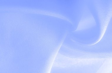 Mavi ipek kumaş, pürüzsüz mavi ipek ya da lüks saten kumaş, düğün arka planı olarak doku. Lüks arka plan tasarımı. Retro biçimi.