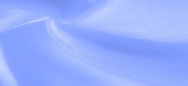 Mavi ipek kumaş, pürüzsüz mavi ipek ya da lüks saten kumaş, düğün arka planı olarak doku. Lüks arka plan tasarımı. Retro biçimi.