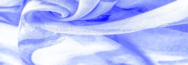 Doku, Desen. Soyut mavi desenli pürüzsüz mavi kumaş dokusu. Lüks soyut bir arka plan. Lüks Noel geçmişi. Kumaş, narin.