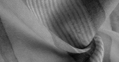 Doku. Geçmişi. Tek renkli gri ipek kumaş, bir fotoğraf ya da resim siyah beyaz ya da tek renk farklı tonlarda geliştirilmiş ya da uygulanmış..