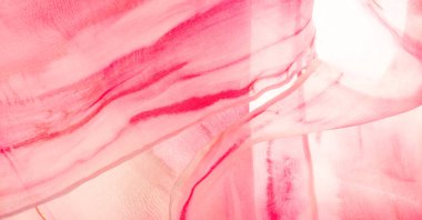 Kırmızı ve bej kumaşlar, bej arkaplanda kırmızı lekeler var. Soyut tasarımcı kumaş tasarımcısı. Tasarımın için güzel bir arka plan. Doku. Görüntü. çizim, kalıp, şekil