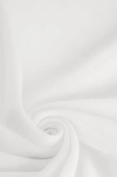 White cloth. abstract background of luxury fabric or liquid silk texture of waves or wavy folds. background or elegant wallpaper design. Cotton texture, natural fabric and dye, bright white color.