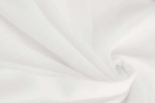 White cloth. abstract background of luxury fabric or liquid silk texture of waves or wavy folds. background or elegant wallpaper design. Cotton texture, natural fabric and dye, bright white color.