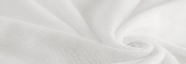 White cloth. abstract background of luxury fabric or liquid silk texture of waves or wavy folds. background or elegant wallpaper design. Cotton texture, natural fabric and dye, bright white color.