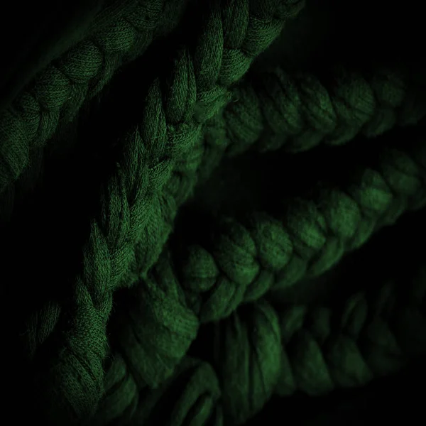 绿色辫子织物 针织背景 花纹斑纹 编织中的辫子 — 图库照片