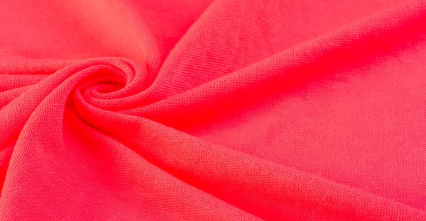 Kırmızı bez. Lüks kumaşın soyut arka planı ya da dalgaların sıvı ipek dokusu ya da dalgalı kıvrımlar. arka plan ya da zarif duvar kağıdı tasarımı. Pamuk dokusu, doğal kumaş ve boya, parlak kırmızı renk..