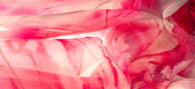 Kırmızı ve bej kumaşlar, bej arkaplanda kırmızı lekeler var. Soyut tasarımcı kumaş tasarımcısı. Tasarımın için güzel bir arka plan. Doku. Görüntü. çizim, kalıp, şekil