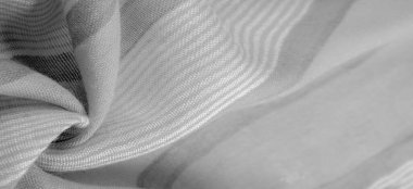 Doku. Geçmişi. Tek renkli gri ipek kumaş, bir fotoğraf ya da resim siyah beyaz ya da tek renk farklı tonlarda geliştirilmiş ya da uygulanmış..