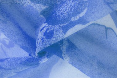 Doku. Geçmişi. şablon. Soyut mavi ipek şifon kumaş. Kot ipeği tafta renginde sanatsal düzen.