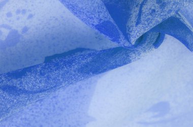 Doku. Geçmişi. şablon. Soyut mavi ipek şifon kumaş. Kot ipeği tafta renginde sanatsal düzen.