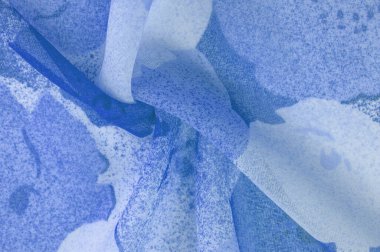 Doku. Geçmişi. şablon. Soyut mavi ipek şifon kumaş. Kot ipeği tafta renginde sanatsal düzen.