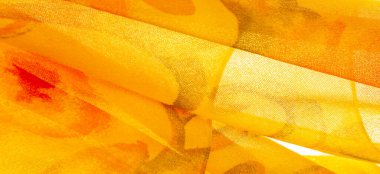 Doku, Desen. Soyut kırmızı baskı ile pürüzsüz sarı kumaş dokusu. Lüks soyut bir arka plan. Lüks Noel geçmişi. Kumaş, narin.