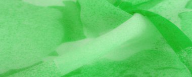 Doku. Geçmişi. şablon. Soyut yeşil ipek şifon kumaş. Bahar yeşili tafta ipek kumaşın sanat modeli.