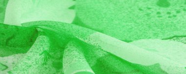 Doku. Geçmişi. şablon. Soyut yeşil ipek şifon kumaş. Bahar yeşili tafta ipek kumaşın sanat modeli.